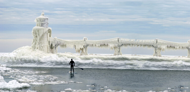 The Frozen Beauty of Lake Michigan Lighthouses in Winter